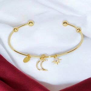 Gold Charm Bangle Bracelet Cuff with Star & Moon Charms Celestial Quiet Luxury